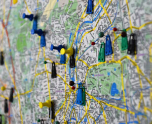 close-up of a wall map of northern Germany with pin markers